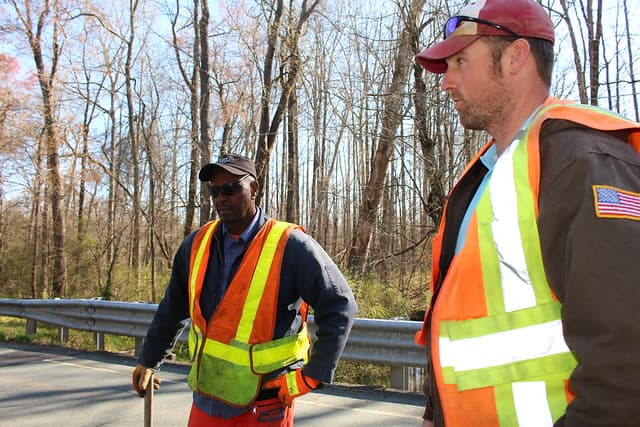Workers arriving together at a new project